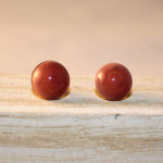 Pendientes de botón malva